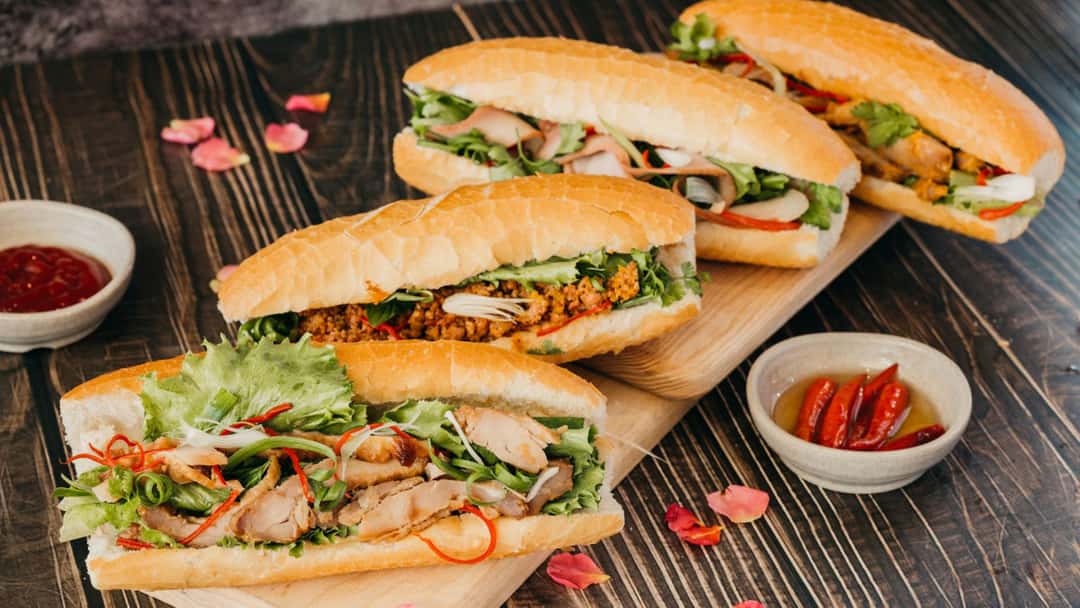 wooden board of banh mi - banner image