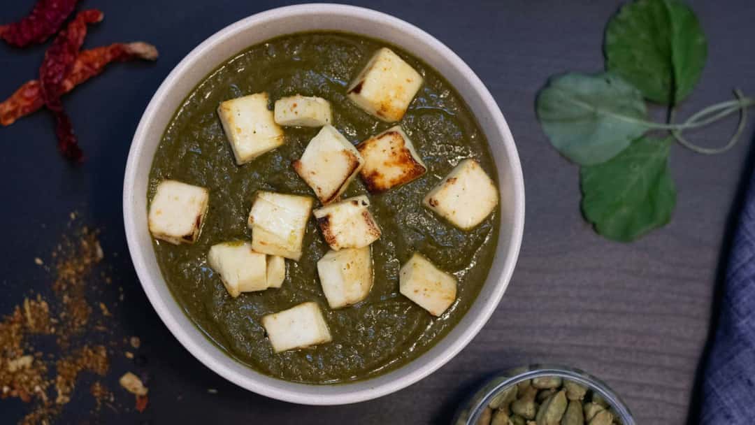 Creamy Palak Paneer served in a bowl