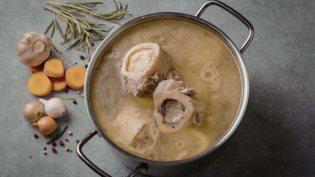 Bone broth in a vessel.