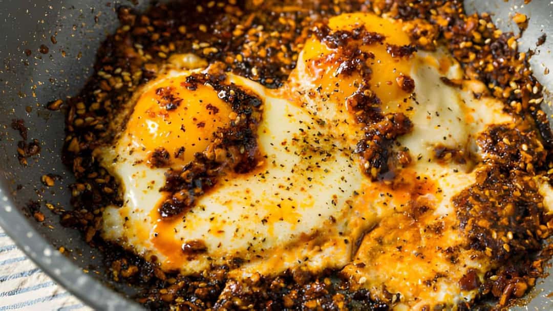 Top view of chilli oil eggs in a pan