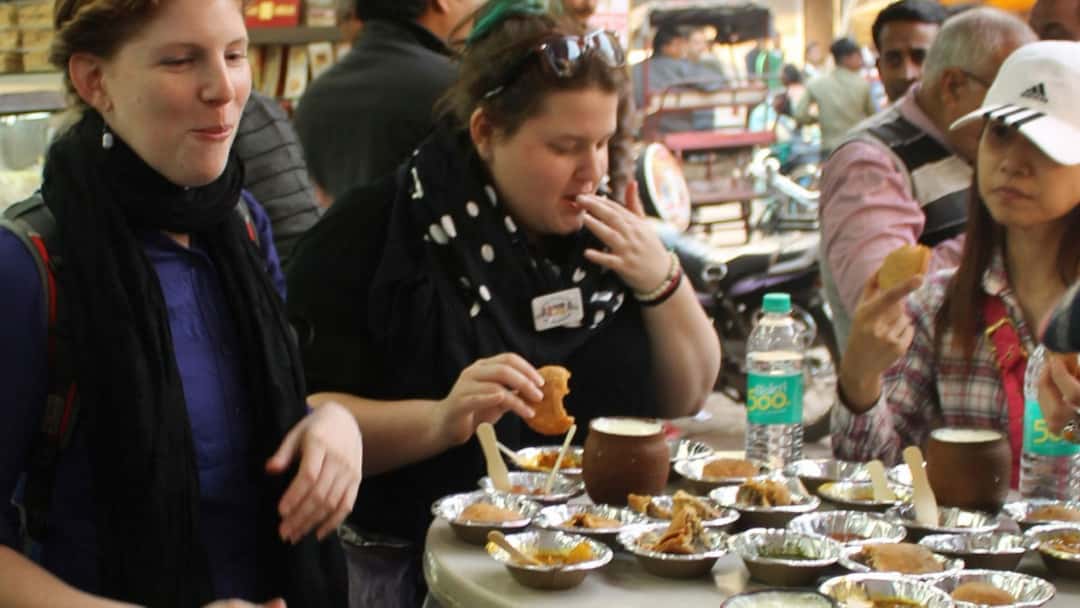 Tourists consuming food in India