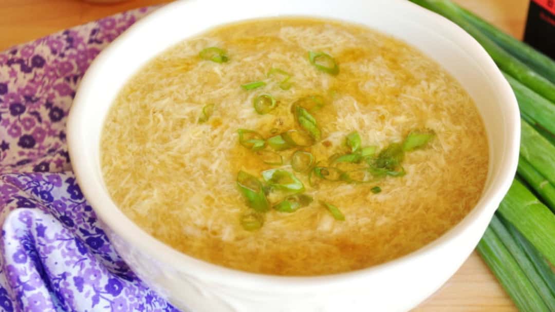 Chinese egg drop soup in a white bowl