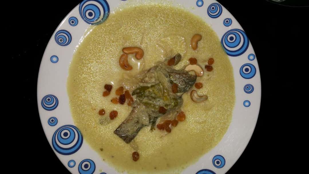 Fish moilee in a bowl - banner image