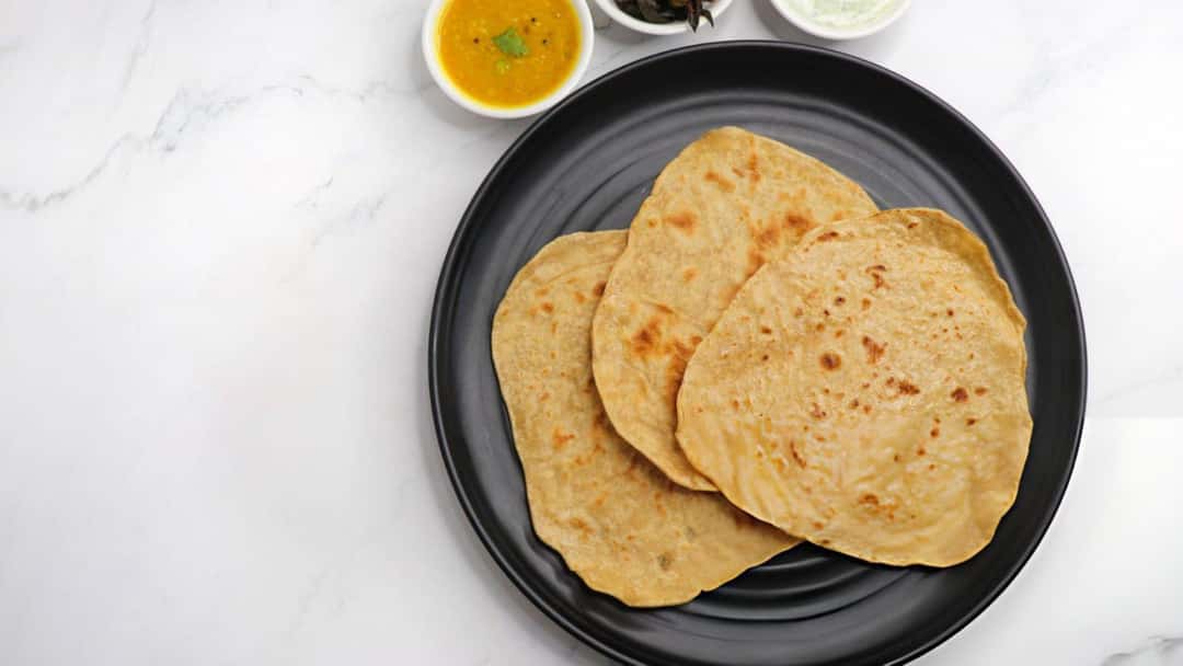 Freshly made parathas on a plate
