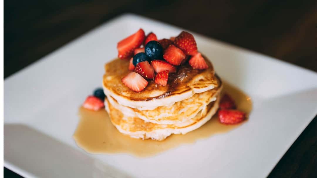 Stack of amaranth pancakes on a plate