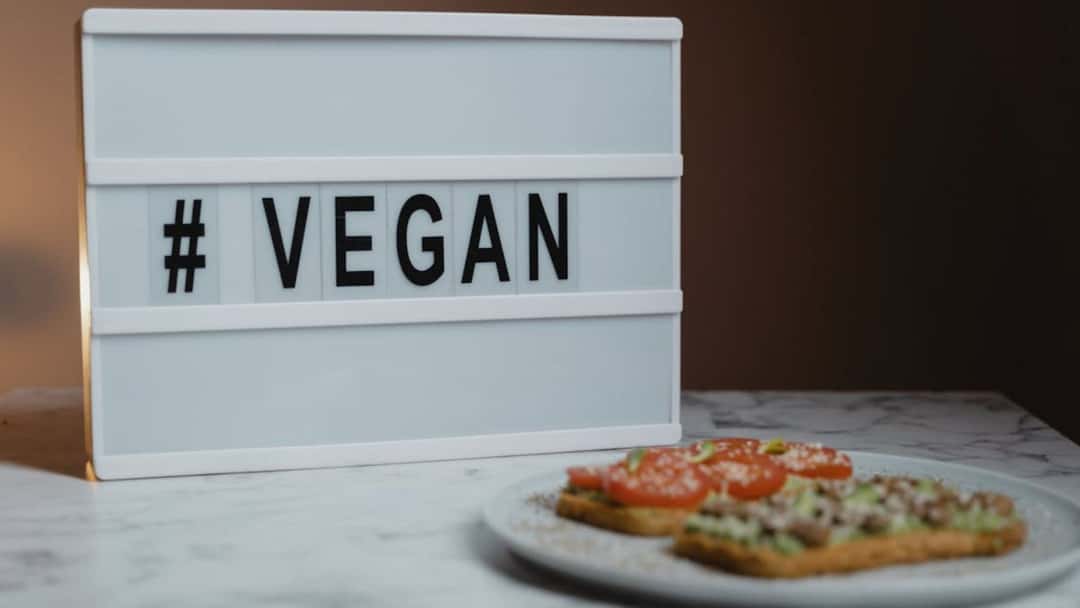 Vegan meal with signage on a table
