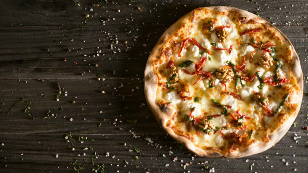 Italian pizza with herbs.