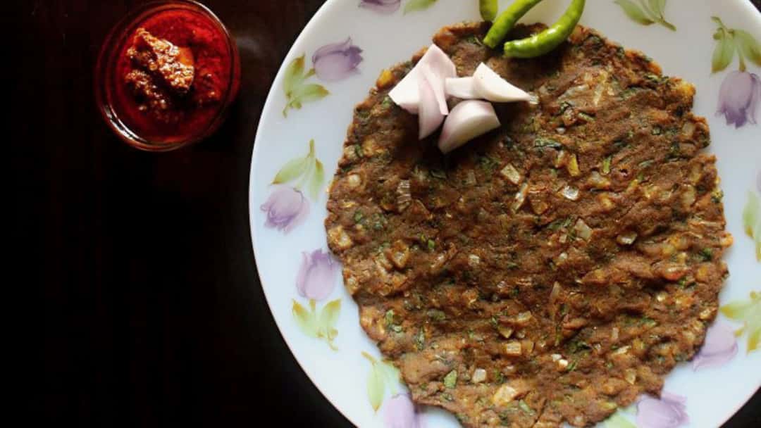 Khapli wheat thalipeeth on a plate