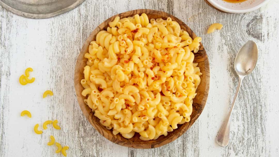 Top view of macroli patata in a bowl. (banner image)