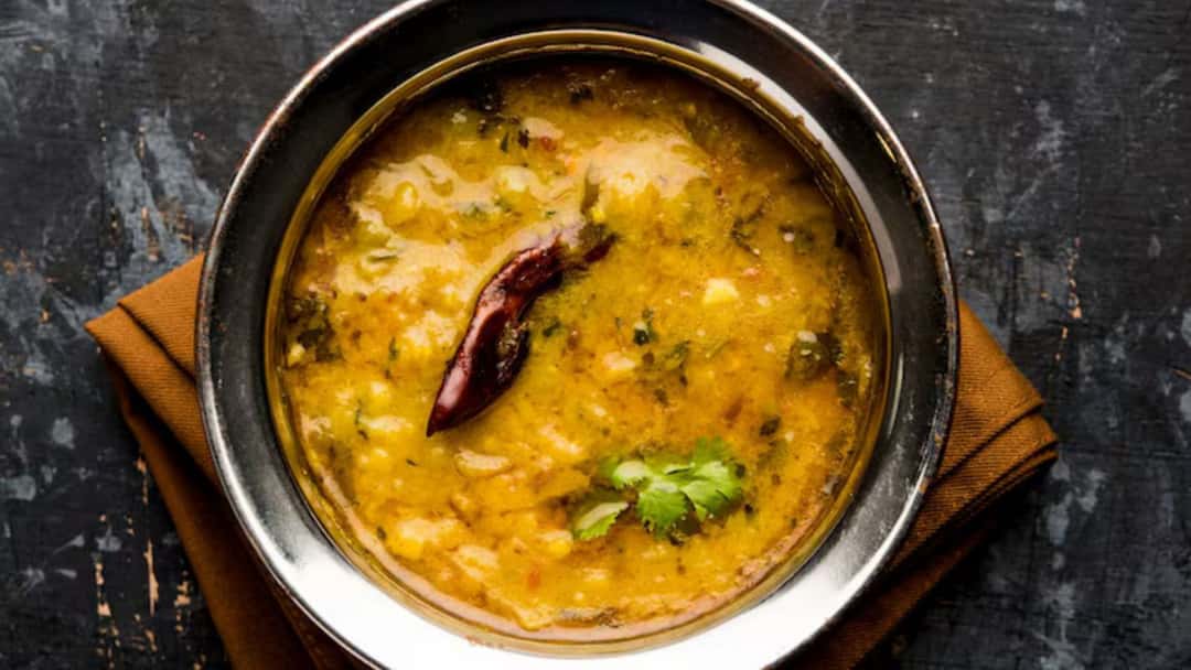 Smoky dal tadka with coriander and red chilli.