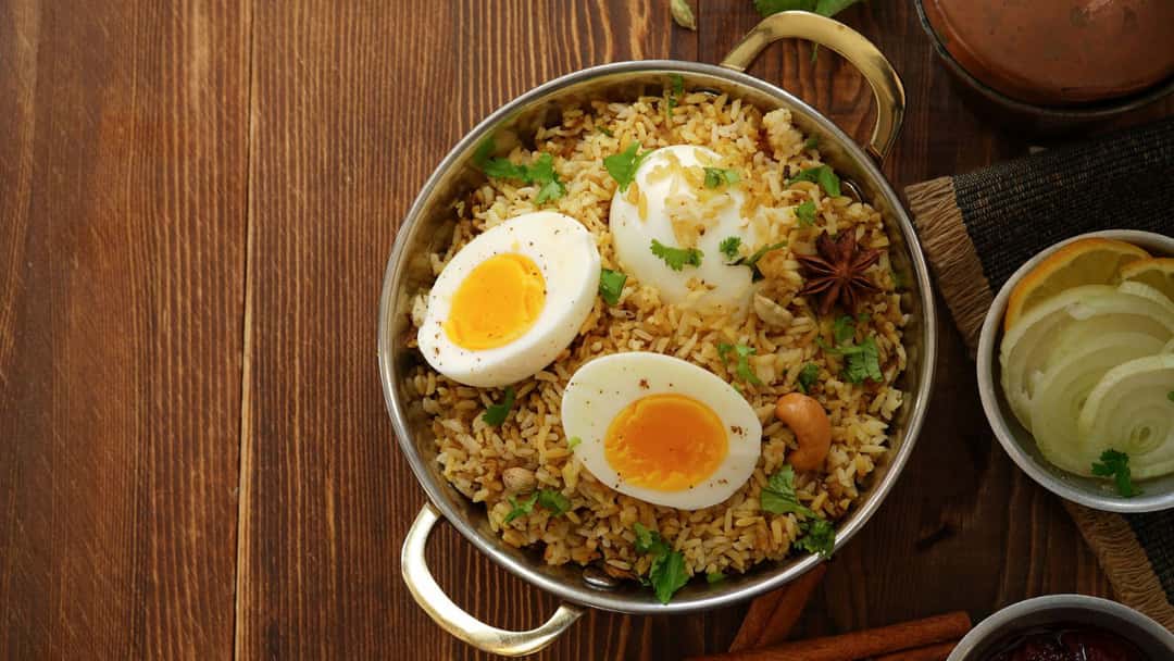 Dindigul biryani plated in a kadhai