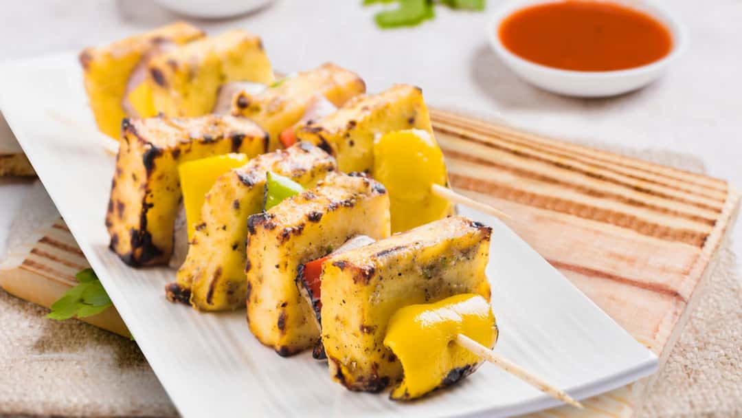 Colourful spread of seven paneer dishes
