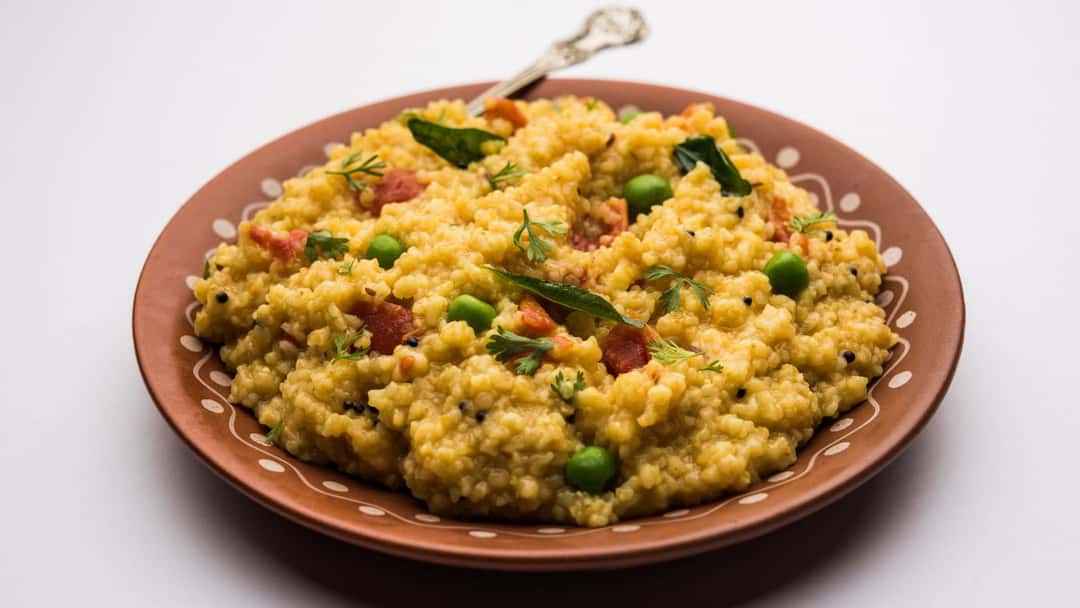 A bowl of moong dal khichdi with veggies