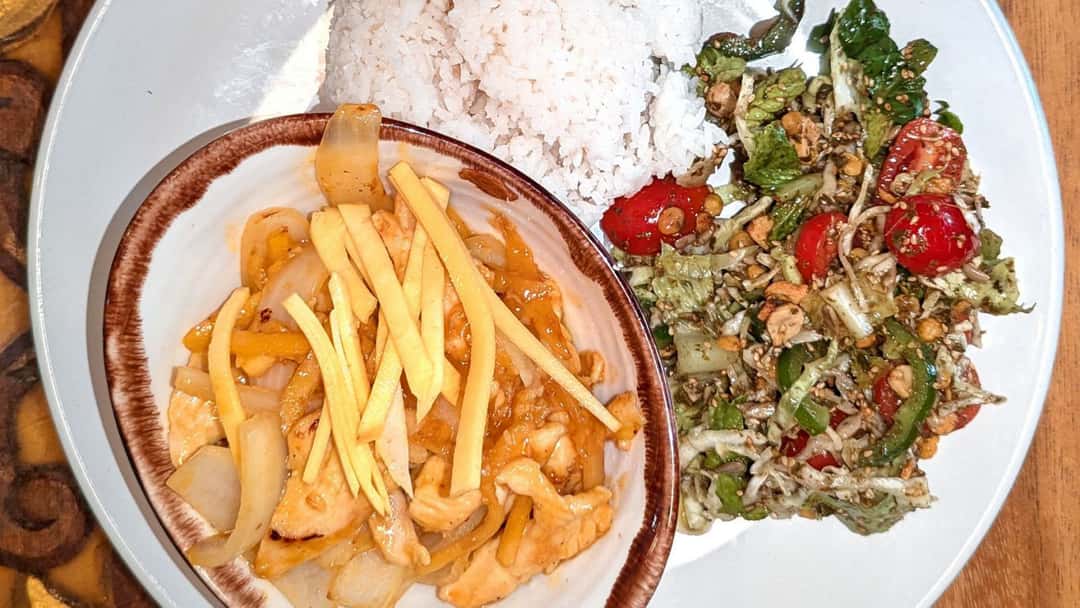 Mango stir fry with rice and salad.