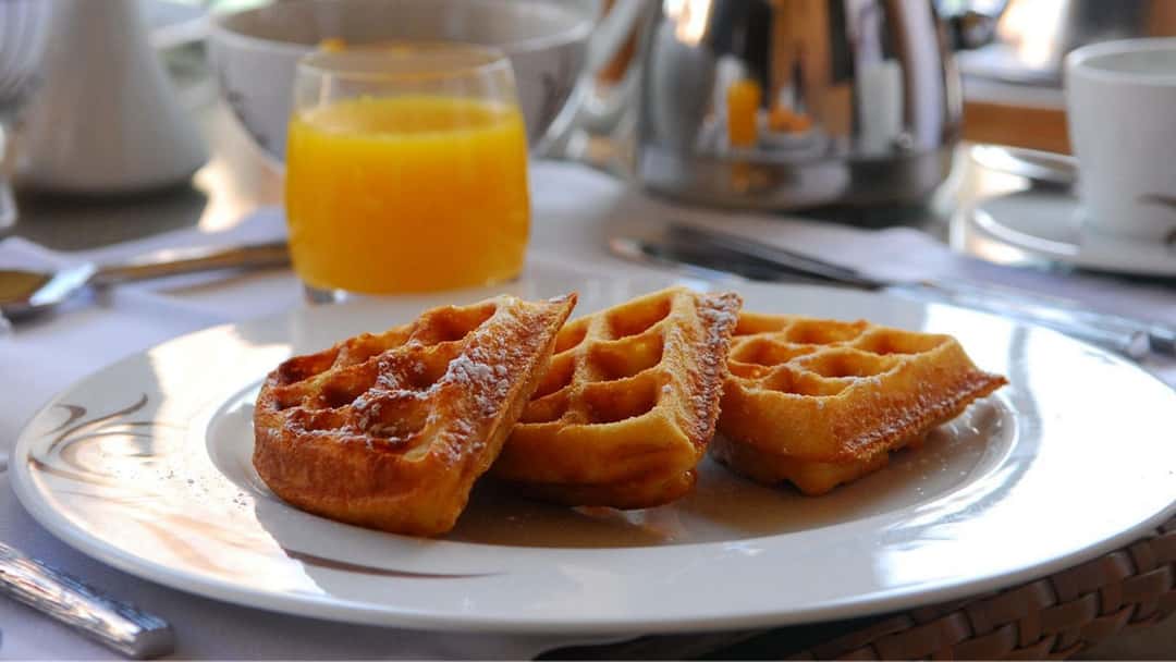Masala dosa waffle slices on a plate