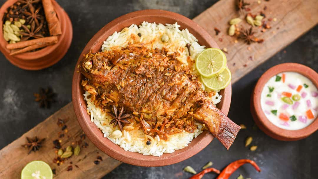 Top view of fish biryani on a plate