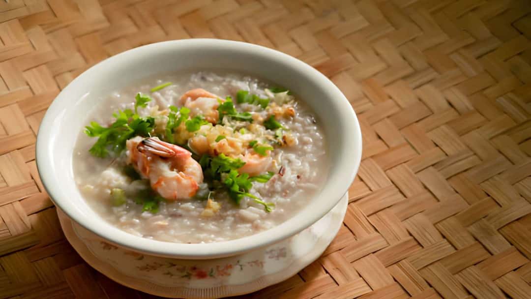 Prawn brown rice congee served warm with ginger and spring onions