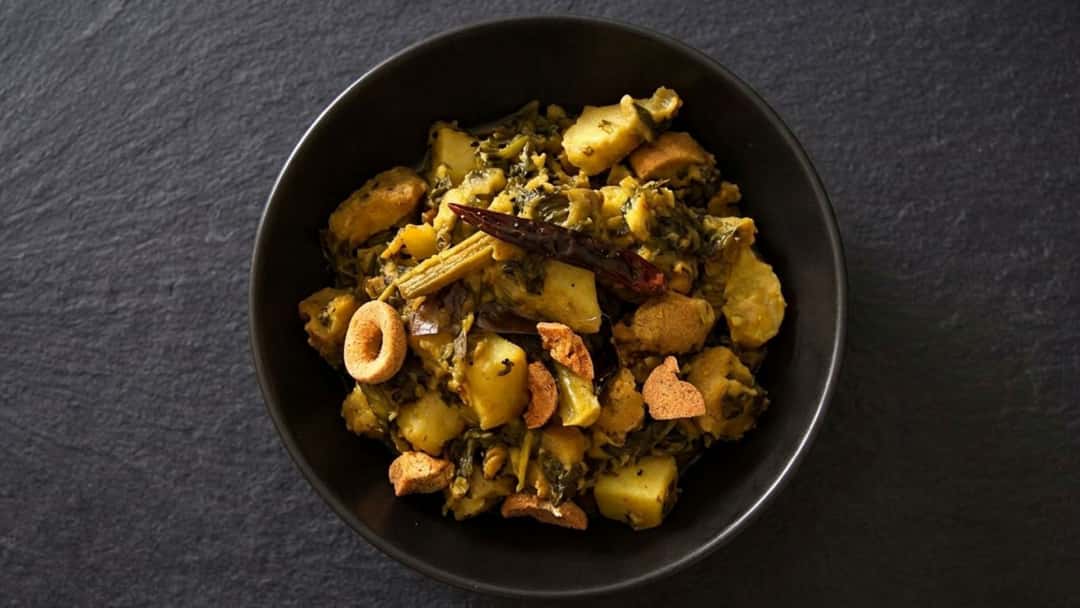 Top view of pui saag er chorchori in a bowl