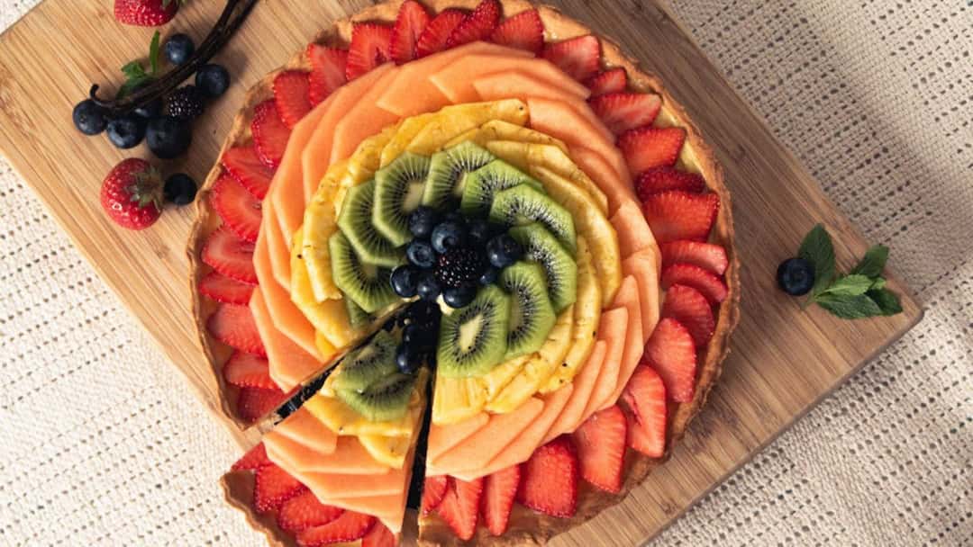 Fruit tart with rangoli style pattern