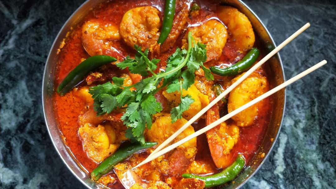 Raw mango prawn curry in a bowl