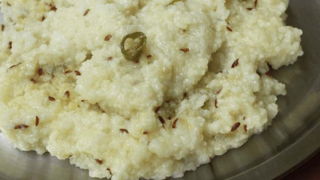 Top view of samak rice khichdi on a plate. (banner image)
