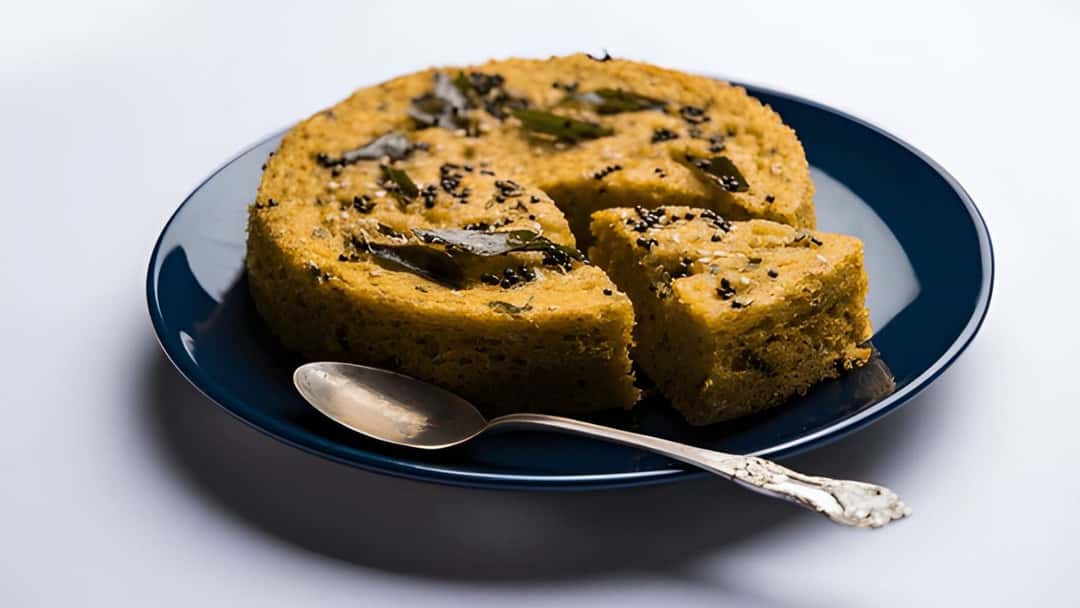 Steamed vegetable handvo on a plate