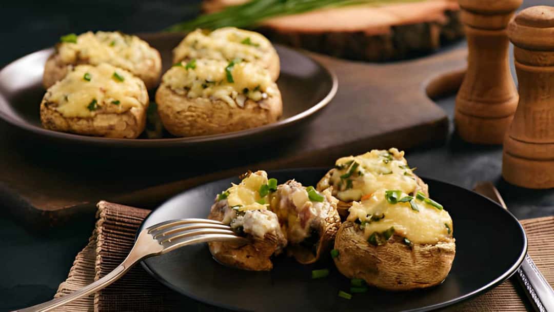 Baked stuffed mushroom caps on a plate