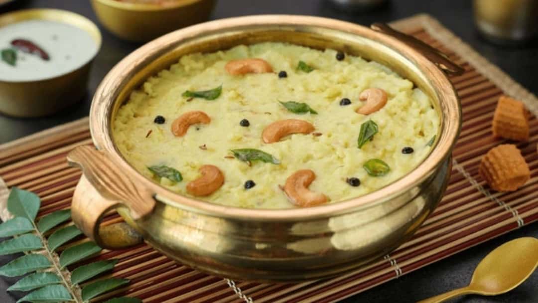 Venn pongal in a traditional brass handi