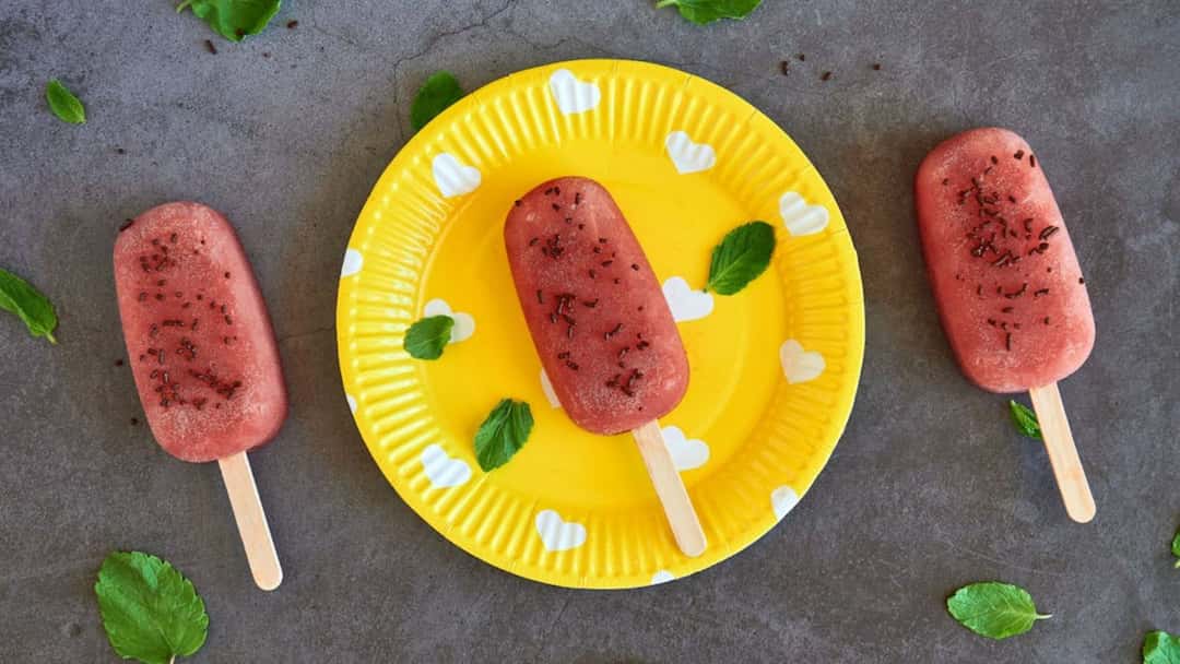Watermelon Popsicles on a table - banner image