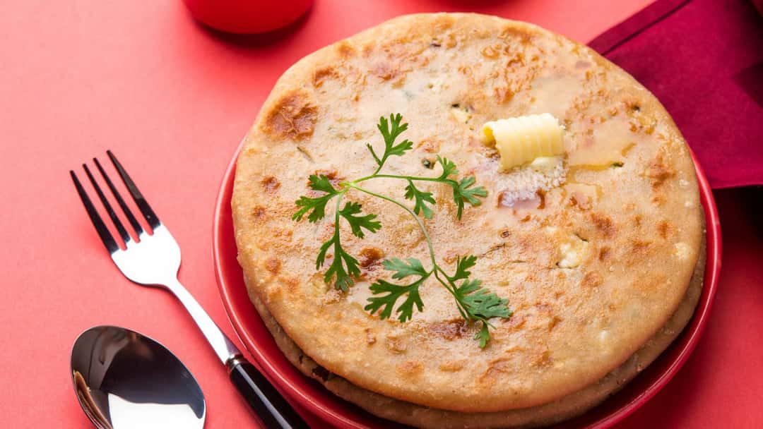 Aloo paratha on a plate - banner image