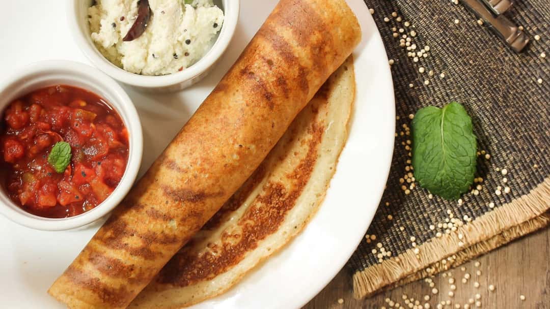 Moong dal dosa with fillings and condiments 