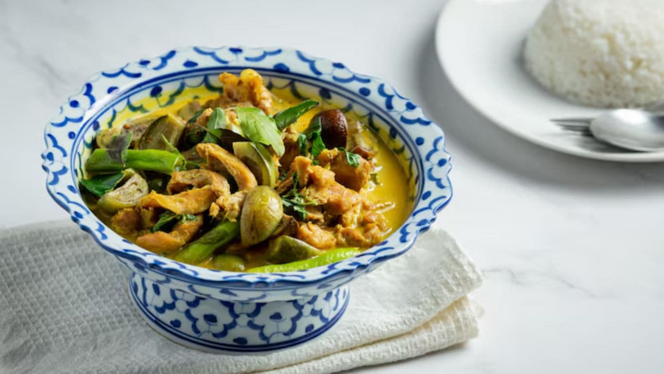 Thai Green Curry with Vegetables in Porcelain Bowl