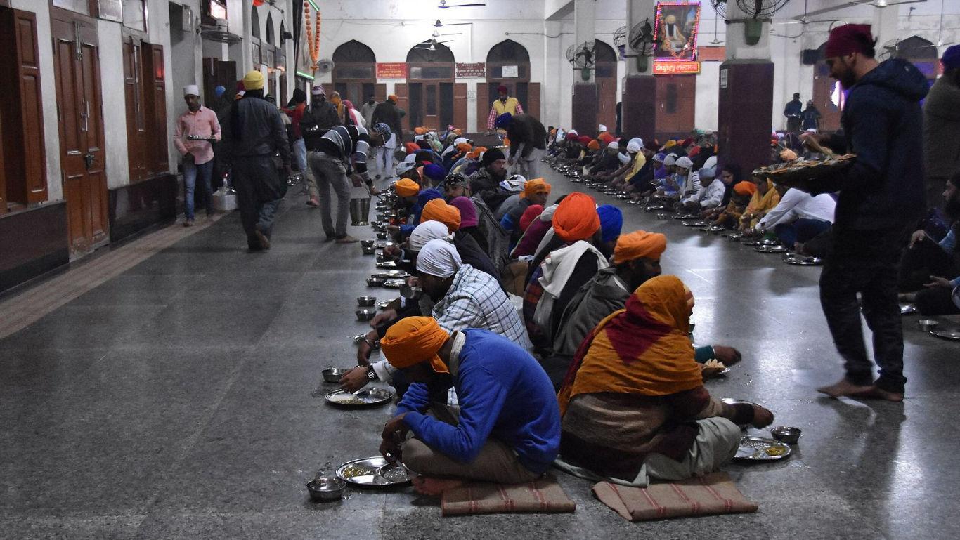 Community meal gathering in Sikh temple