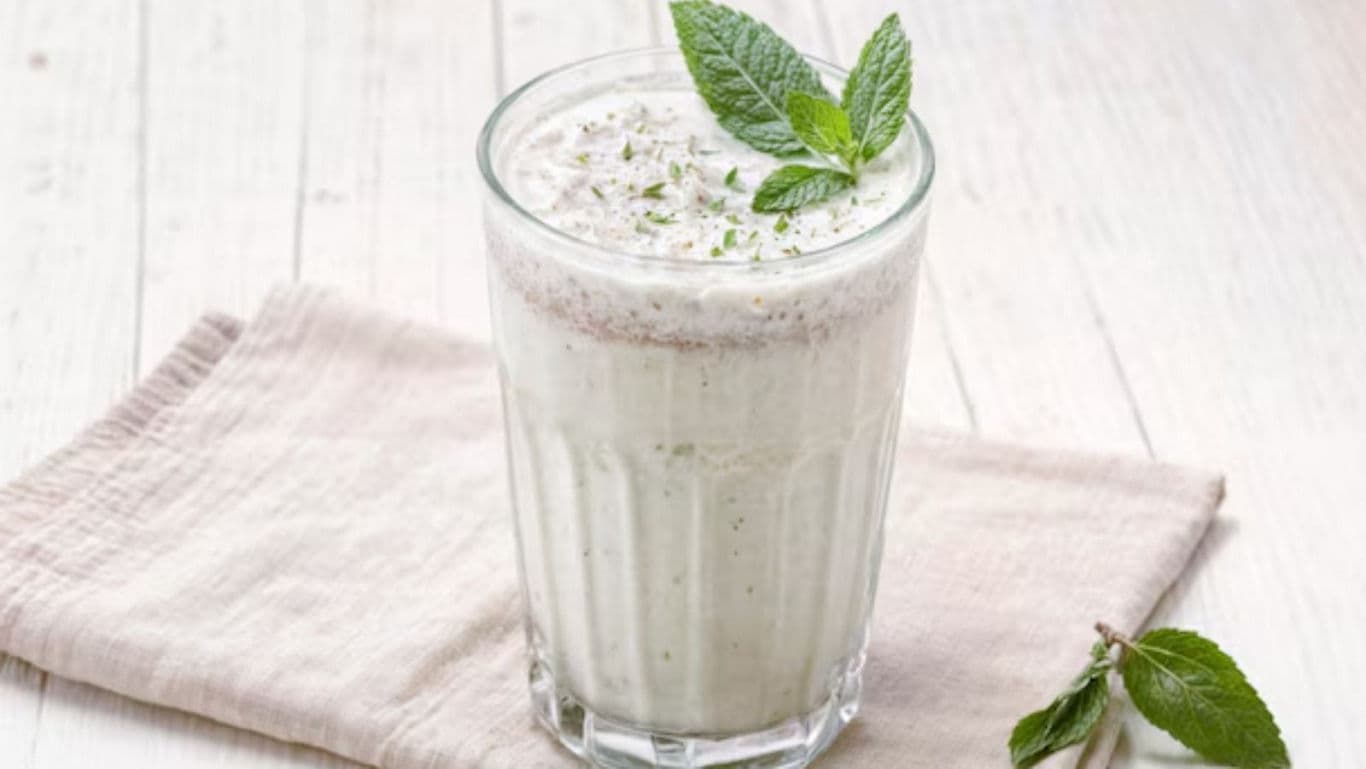 Refreshing mint yogurt drink in glass