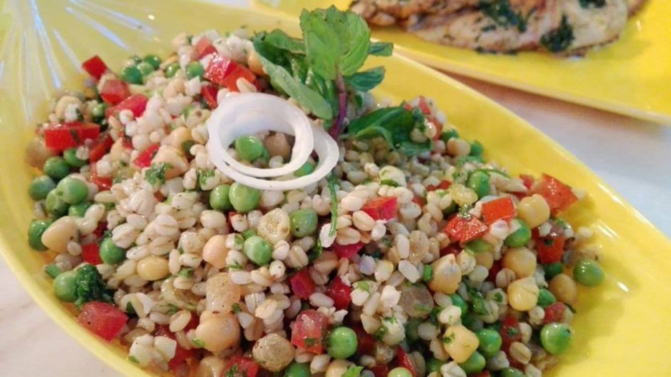 Colorful grain and vegetable salad closeup