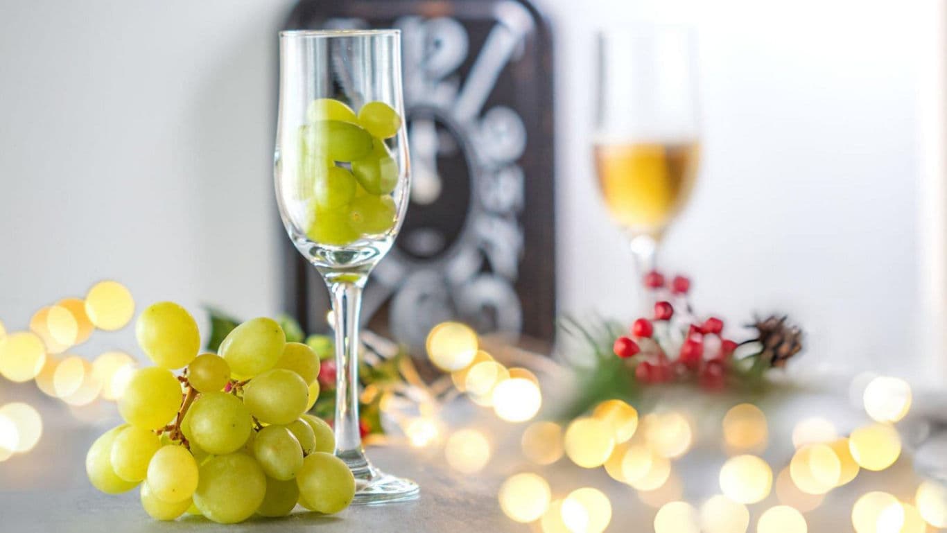 Festive grapes with wine and decor