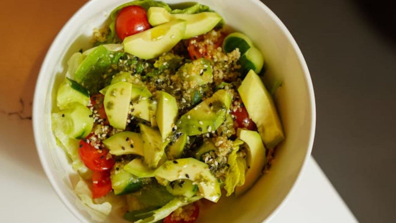 Fresh avocado quinoa salad with cherry tomatoes