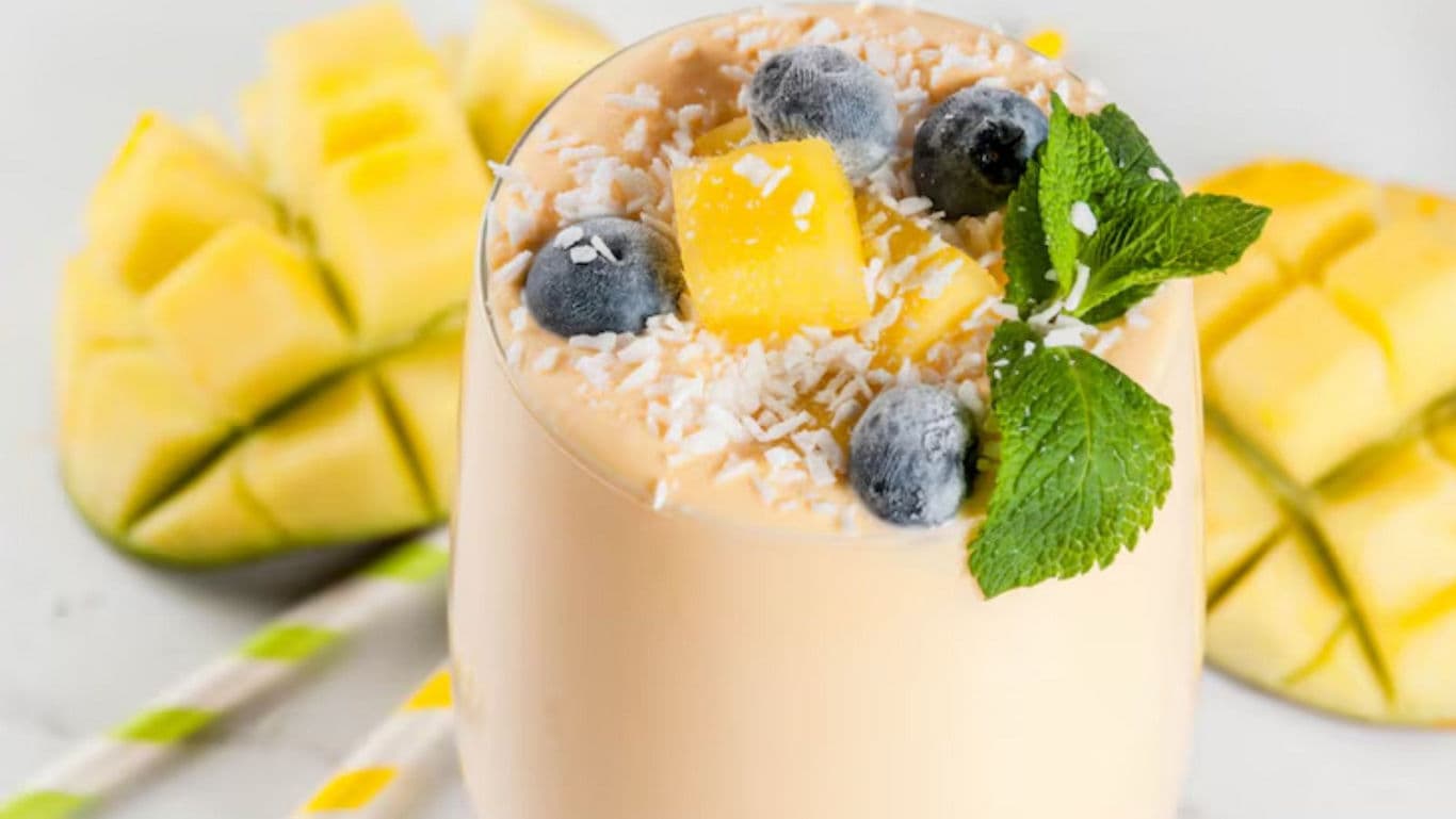Tropical Mango Smoothie with Blueberries and Mint