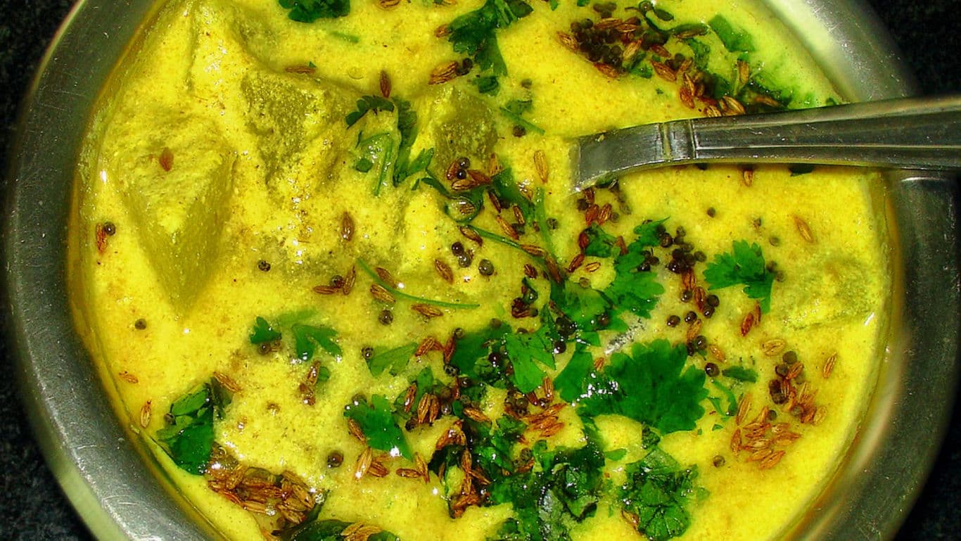 Traditional Indian Kadhi with Fresh Coriander Garnish