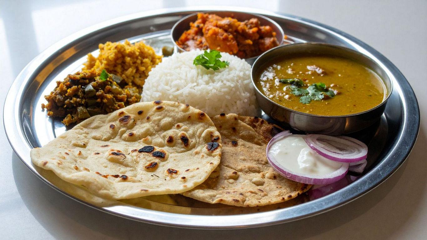 Traditional Indian thali with assorted dishes