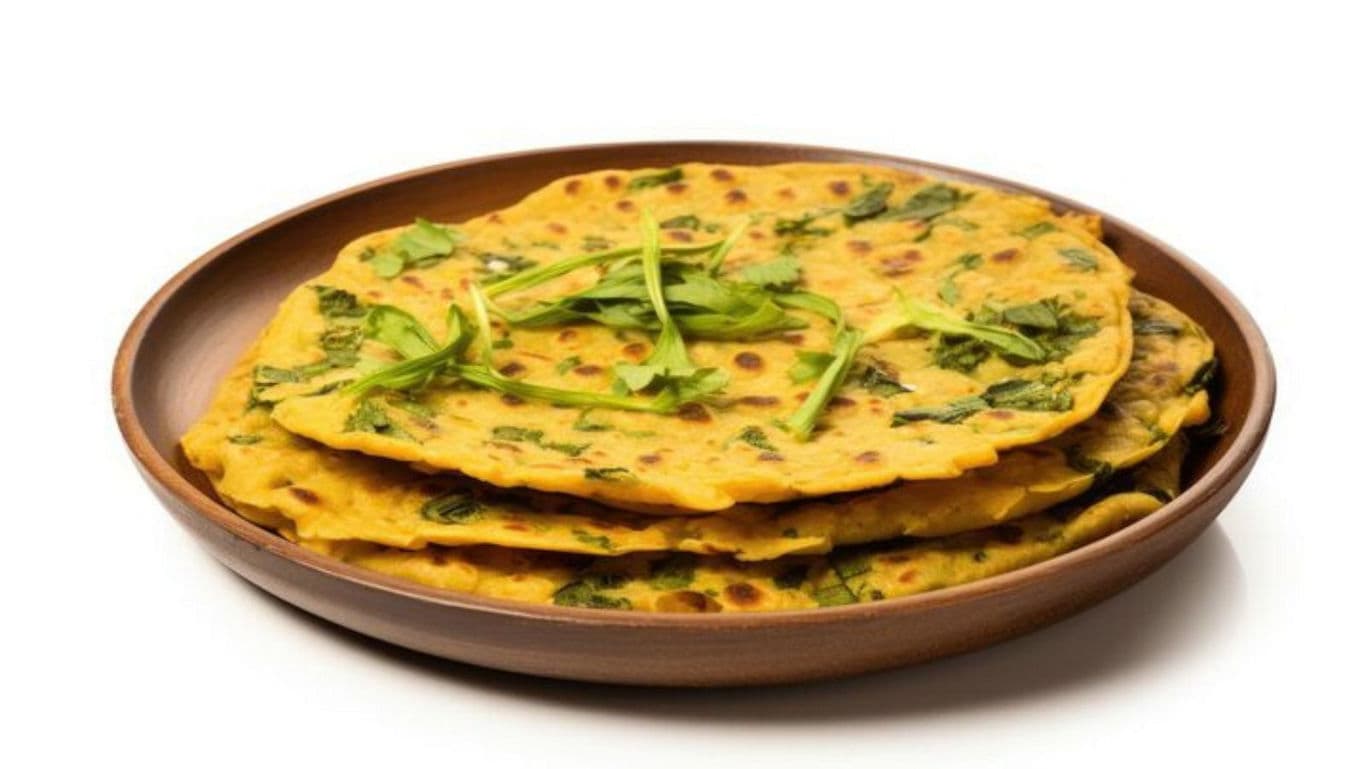 Stack of Indian flatbreads garnished with cilantro