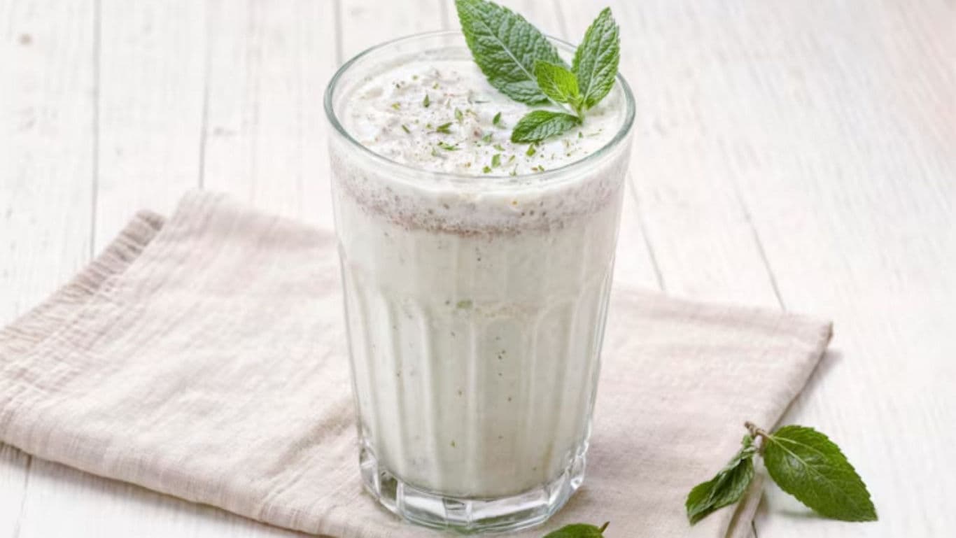 Refreshing mint yogurt smoothie in glass