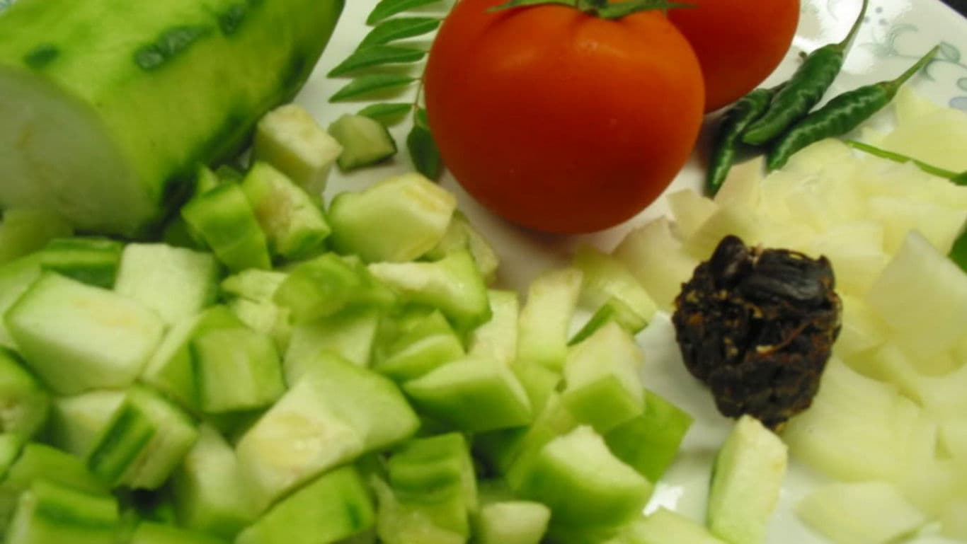 Fresh chopped vegetables and spices closeup