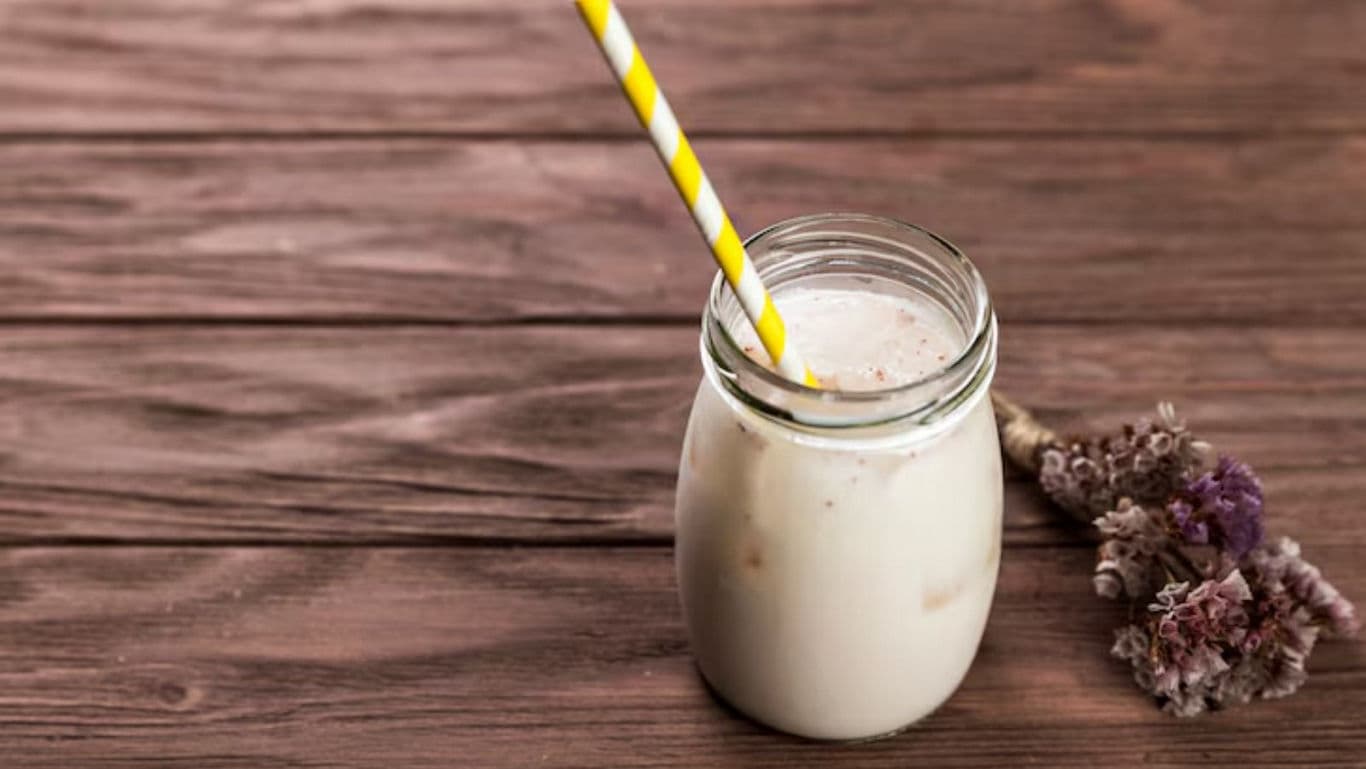 Iced milk drink in glass jar