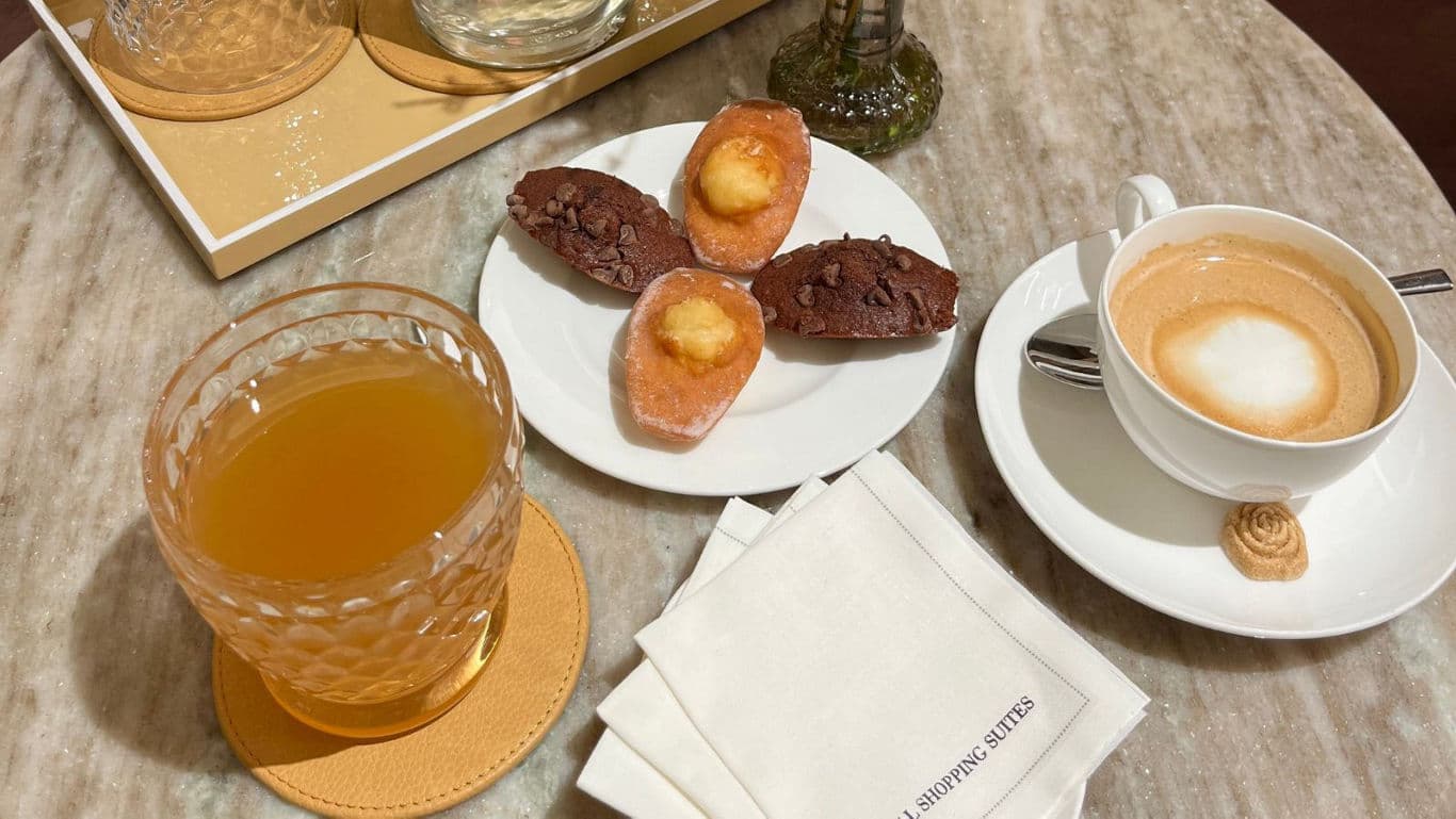 Coffee and tea with assorted petite cakes