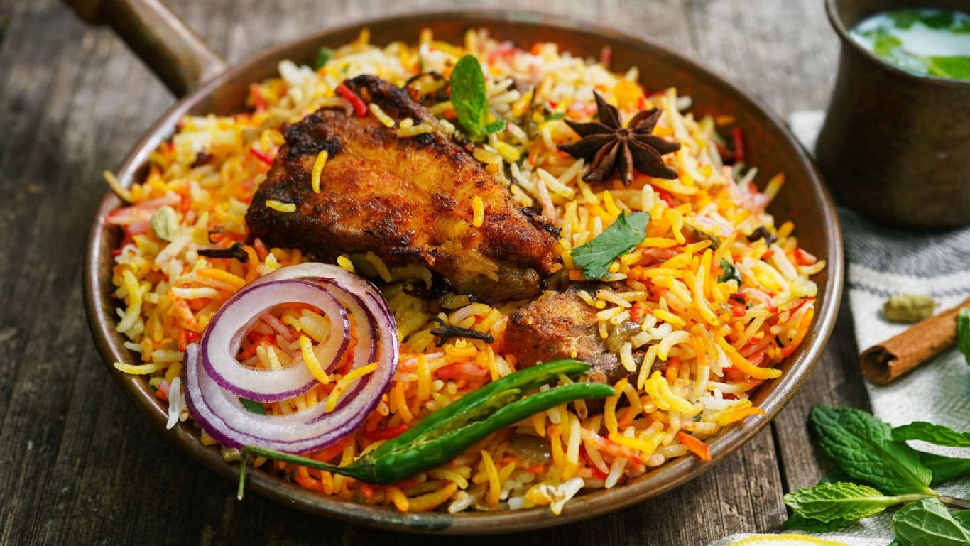 Spiced Chicken Biryani with Aromatic Rice and Herbs