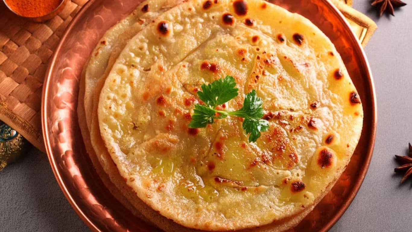 Golden flatbreads garnished with cilantro