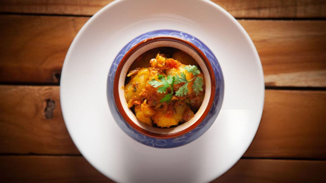 A potato dish in a bowl.