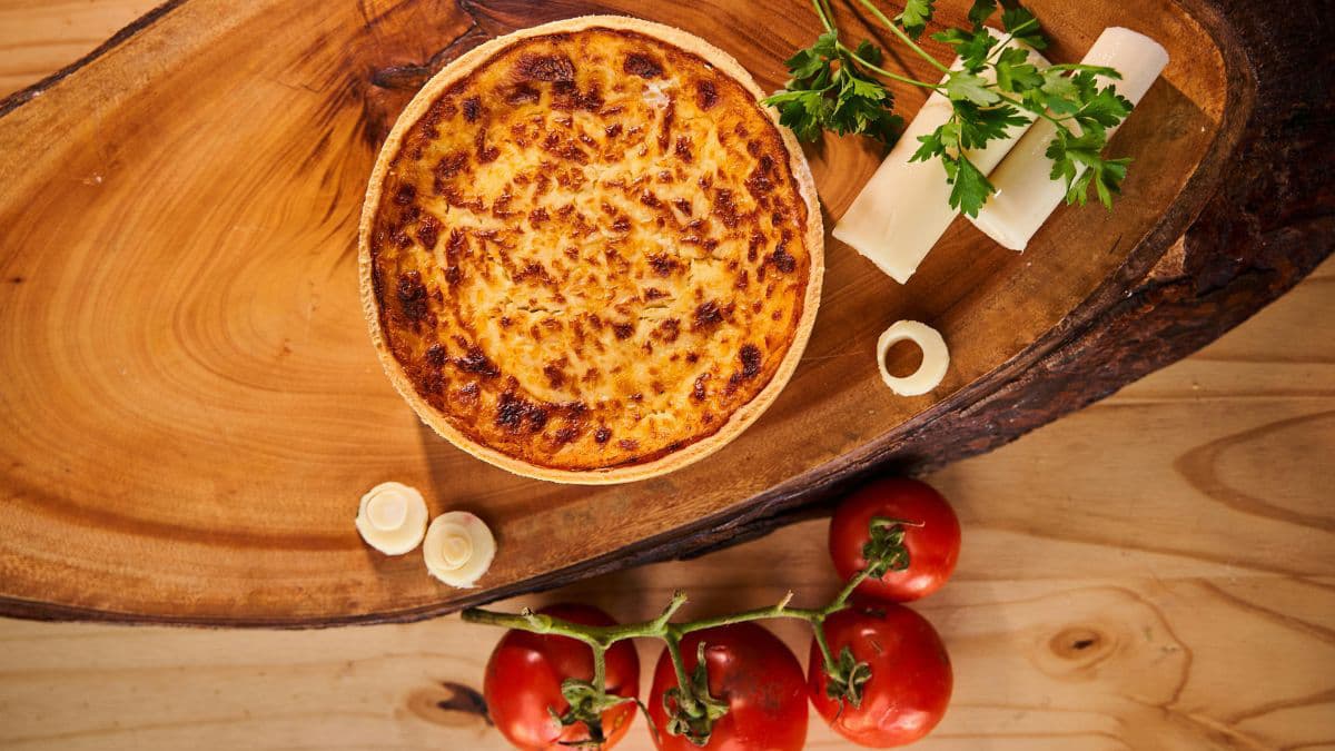 quiche with tomatoes on the side