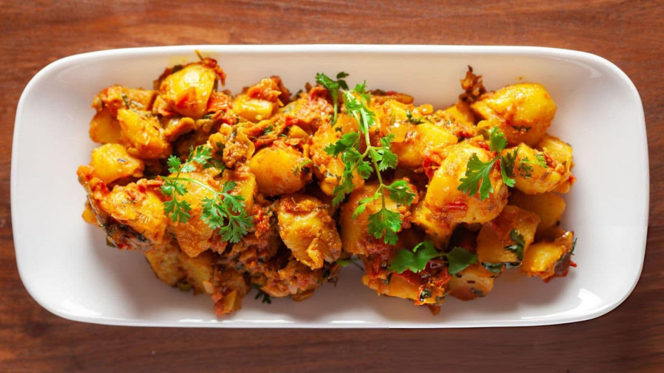 Spiced Potato Curry Garnished with Fresh Cilantro